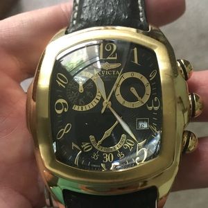 Invicta watch men’s black and gold